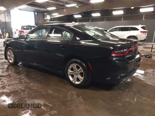 2021 Dodge Charger SXT with VIN 2C3CDXBG8MH541839, listed as a IAAI auction lot 41620879 with 79,889 mi miles. Bid and sale history available at carsss.com. Image 3.