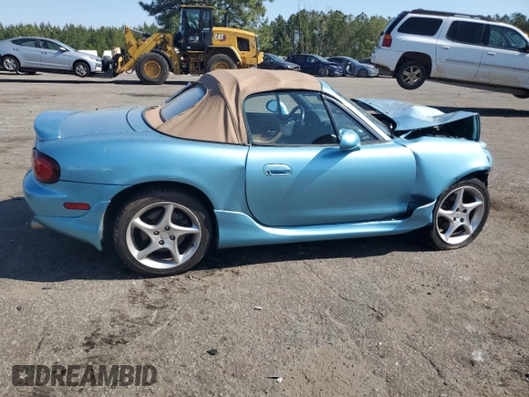 2001 Mazda MX-5 Miata z VIN JM1NB353910216600, wystawiony jako Copart lot #50916465 z przebiegiem Nie podano mil oraz Szkoda całkowita • Salvage title. Historia ofert i sprzedaży dostępna na DreamBid. Obrazek 3.