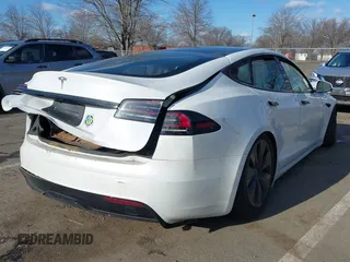 2022 Tesla Model S with VIN 5YJSA1E51NF491493, listed as a IAAI auction lot 41570494 with Not Provided miles and . Bid and sale history available at DreamBid. Image 4.