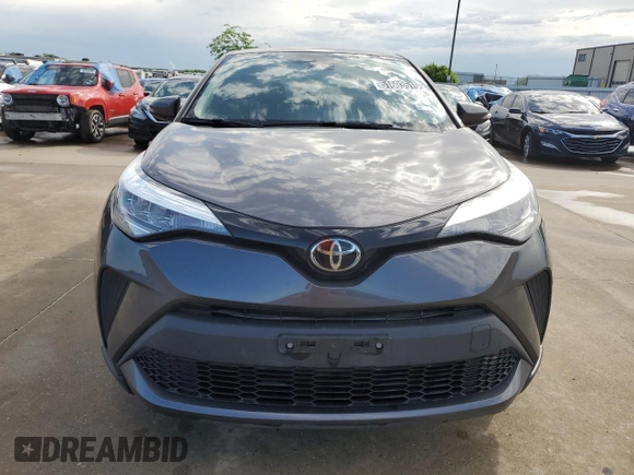 2021 Toyota C-HR LE z VIN JTNKHMBX2M1111227, wystawiony jako Copart lot #51603515 z przebiegiem 73 192 mil mil oraz Czysty tytuł • Clean title. Historia ofert i sprzedaży dostępna na DreamBid. Obrazek 5.