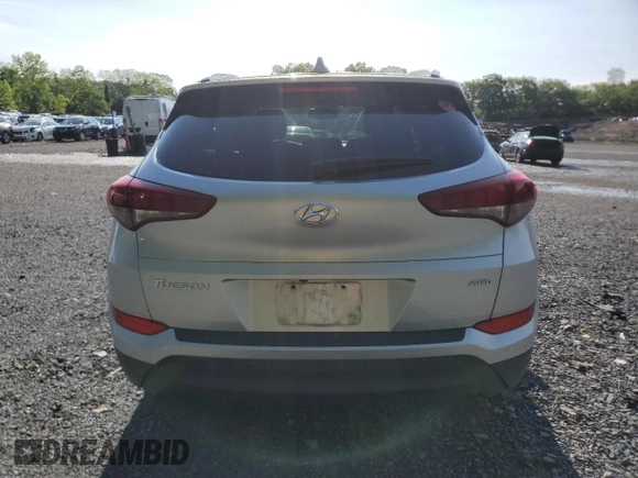 2018 Hyundai Tucson SEL with VIN KM8J3CA49JU666942, listed as a Copart auction lot 58911095 with 73,839 mi miles and Salvage title. Bid and sale history available at DreamBid. Image 6.