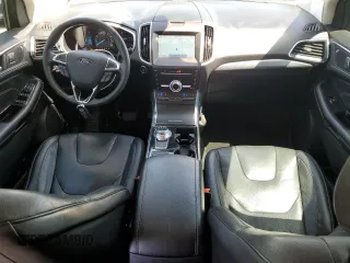 2019 Ford Edge Titanium z VIN 2FMPK4K91KBB81098, wystawiony jako Copart lot #53604115 z przebiegiem 70 179 mil mil oraz Szkoda całkowita • Salvage title. Historia ofert i sprzedaży dostępna na DreamBid. Obrazek 8.
