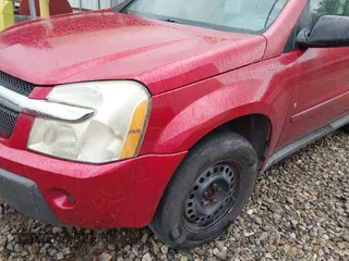 2006 Chevrolet Equinox LS with VIN 2CNDL13F766055149, listed as a IAAI auction lot 41870455 with 190,943 mi miles. Bid and sale history available at carsss.com. Image 6.
