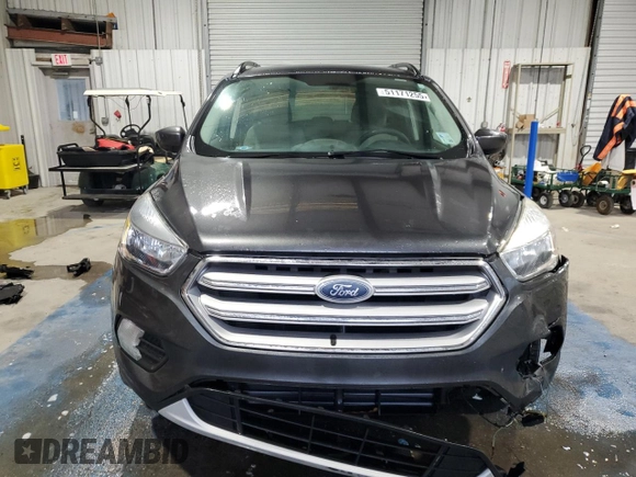 2018 Ford Escape SE with VIN 1FMCU9G90JUB48553, listed as a Copart auction lot 51171255 with 134,423 mi miles and Salvage Title. Bid and sale history available at carsss.com. Image 5.