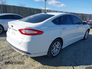 2015 Ford Fusion SE with VIN 3FA6P0H79FR203135, listed as a IAAI auction lot 41002631 with 110,485 mi miles and . Bid and sale history available at DreamBid. Image 4.