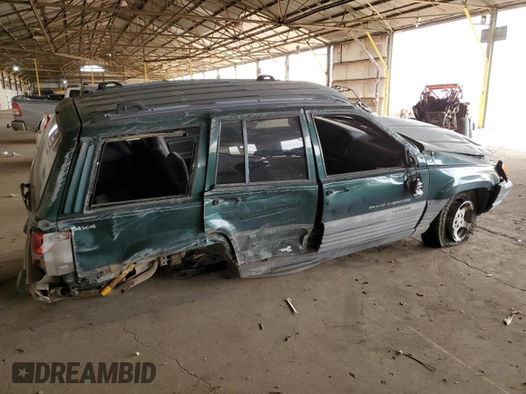 1996 Jeep Grand Cherokee Laredo with VIN 1J4GZ58S6TC304597, listed as a Copart auction lot 52962545 with Not provided miles and Salvage title. Bid and sale history available at DreamBid. Image 3.