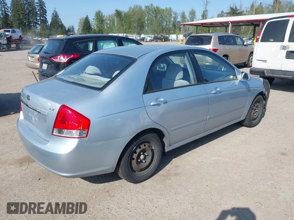 2007 Kia Spectra EX with VIN KNAFE121175389331, listed as a IAAI auction lot 42078709 with 199,324 mi miles. Bid and sale history available at carsss.com. Image 4.