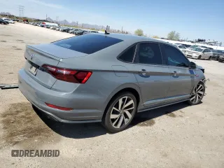 2021 Volkswagen Jetta GLI S с VIN 3VW6T7BUXMM001408, выставлен на аукционе Copart как лот 50454605 с пробегом 73 434 миль миль и Списание • Salvage title. История ставок и продаж доступна на DreamBid. Изображение 3.