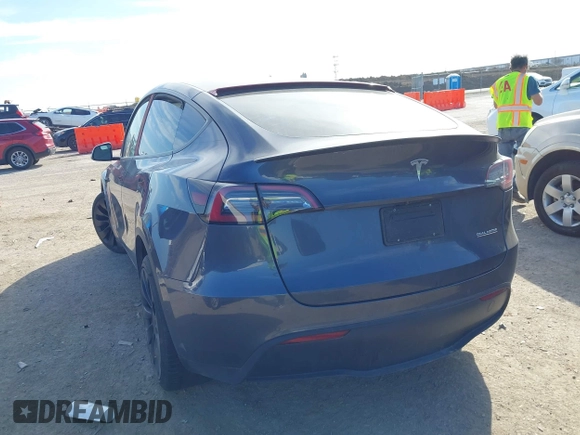 2022 Tesla Model Y Performance z VIN 7SAYGDEF8NF494753, wystawiony jako IAAI lot #41692464 z przebiegiem 14 616 mil mil oraz . Historia ofert i sprzedaży dostępna na DreamBid. Obrazek 3.