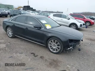 2012 Audi A8 z VIN WAUAVAFD0CN035731, wystawiony jako IAAI lot #41286022 z przebiegiem 82 835 mil mil oraz . Historia ofert i sprzedaży dostępna na DreamBid. Obrazek 1.