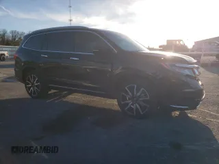 2021 Honda Pilot Touring 8-Passenger with VIN 5FNYF5H94MB039974, listed as a Copart auction lot 82654964 with 54,048 mi miles and Salvage Title. Bid and sale history available at DreamBid. Image 4.