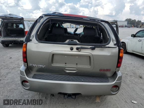 2002 GMC Envoy SLT with VIN 1GKDT13SX22380133, listed as a Copart auction lot 69816144 with 90,060 mi miles and Salvage Title. Bid and sale history available at DreamBid. Image 6.