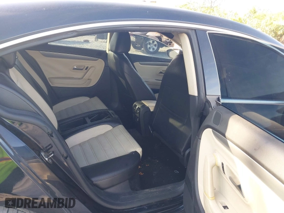 2012 Volkswagen CC Sport PZEV with VIN WVWMP7AN8CE516033, listed as a IAAI auction lot 42081542 with 168,497 mi miles. Bid and sale history available at carsss.com. Image 8.