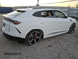 2022 Lamborghini Urus z VIN ZPBUA1ZL3NLA17004, wystawiony jako Copart lot #83652724 z przebiegiem 3691 mil mil oraz Tytuł czysty. Historia ofert i sprzedaży dostępna na DreamBid. Obrazek 3.