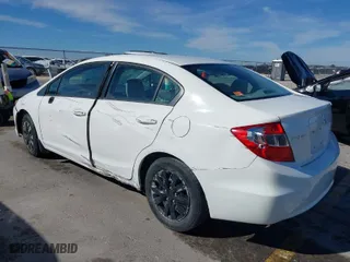 2012 Honda Civic Sdn LX with VIN 2HGFB2F56CH583212, listed as a IAAI auction lot 40943390 with 90,593 mi miles. Bid and sale history available at carsss.com. Image 3.