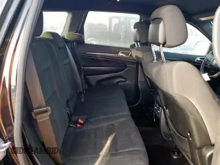 2016 Jeep Grand Cherokee 75th Anniversary with VIN 1C4RJEAG9GC499970, listed as a Copart auction lot 62673925 with 118,627 mi miles and Salvage title. Bid and sale history available at DreamBid. Image 11.