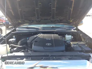 2015 Toyota Tacoma with VIN 3TMLU4EN2FM169326, listed as a IAAI auction lot 40689500 with 77,003 mi miles and . Bid and sale history available at DreamBid. Image 10.