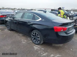 2018 Chevrolet Impala LT with VIN 2G1105S39J9143893, listed as a IAAI auction lot 41707099 with 98,926 mi miles. Bid and sale history available at carsss.com. Image 3.