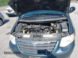 2007 Chrysler Town & Country LWB Touring with VIN 2A4GP54L47R167189, listed as a IAAI auction lot 42143590 with 165,547 mi miles. Bid and sale history available at carsss.com. Image 10.