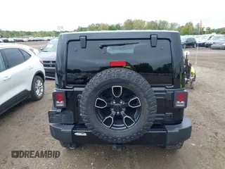 2018 Jeep Wrangler JK Unlimited Altitude with VIN 1C4BJWEG7JL881133, listed as a IAAI auction lot 40404302 with 95,726 mi miles. Bid and sale history available at carsss.com. Image 16.