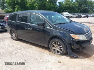 2012 Honda Odyssey EX z VIN 5FNRL5H45CB053642, wystawiony jako IAAI lot #42352886 z przebiegiem 174 925 mil mil oraz . Historia ofert i sprzedaży dostępna na DreamBid. Obrazek 1.