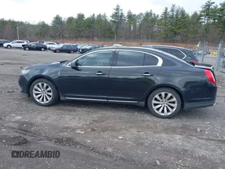 2014 Lincoln MKS with VIN 1LNHL9EK0EG601444, listed as a IAAI auction lot 41849160 with 164,791 mi miles. Bid and sale history available at carsss.com. Image 14.
