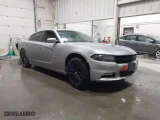 2016 Dodge Charger SXT with VIN 2C3CDXJG9GH180966, listed as a IAAI auction lot 41243491 with 127,235 mi miles. Bid and sale history available at carsss.com. Image 1.
