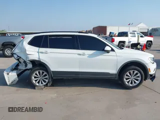 2018 Volkswagen Tiguan S with VIN 3VV1B7AX1JM119971, listed as a IAAI auction lot 42039977 with 108,932 mi miles and . Bid and sale history available at DreamBid. Image 13.