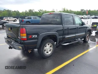 2006 GMC Sierra 1500 SLT with VIN 2GTEK13T561232618, listed as a IAAI auction lot 42086899 with 310,473 mi miles and . Bid and sale history available at carsss.com. Image 4.