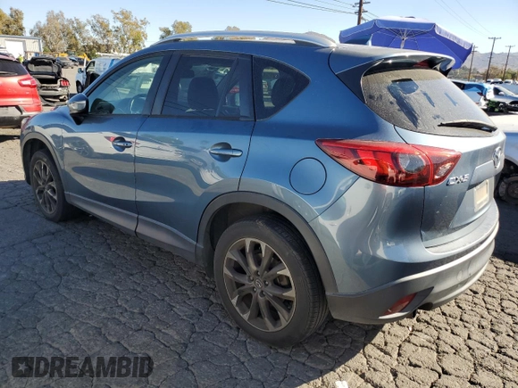 2016 Mazda CX-5 Grand Touring with VIN JM3KE2DY8G0644790, listed as a Copart auction lot 82060424 with 0 mi miles and Clean Title. Bid and sale history available at carsss.com. Image 2.