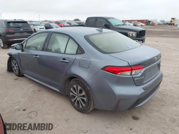 2021 Toyota Corolla Hybrid LE with VIN JTDEAMDE8MJ002711, listed as a IAAI auction lot 41498716 with 98,559 mi miles. Bid and sale history available at carsss.com. Image 3.