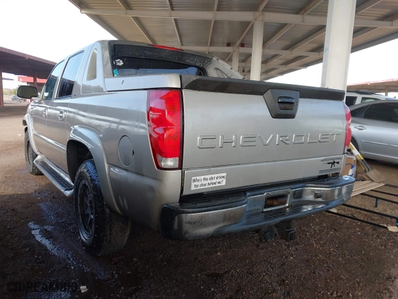 2005 Chevrolet Avalanche Z71 with VIN 3GNEK12Z35G284607, listed as a IAAI auction lot 41868849 with 213,834 mi miles. Bid and sale history available at carsss.com. Image 3.