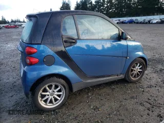 2010 Smart fortwo Pure z VIN WMEEJ3BA3AK353317, wystawiony jako Copart lot #48560975 z przebiegiem 163 175 mil mil oraz Czysty tytuł • Clean title. Historia ofert i sprzedaży dostępna na DreamBid. Obrazek 3.