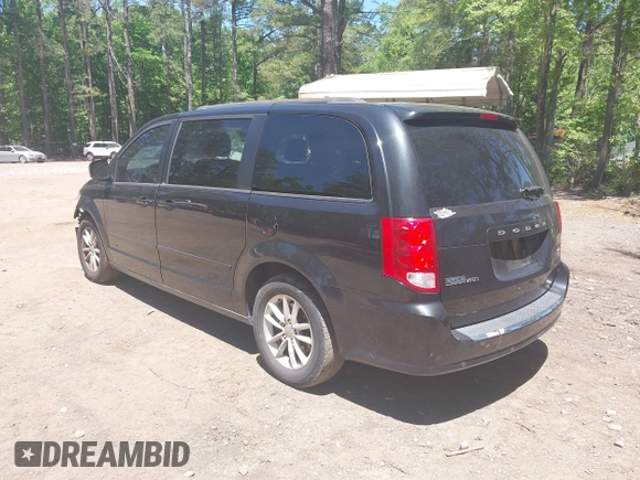 2014 Dodge Grand Caravan SXT with VIN 2C4RDGCG2ER313531, listed as a IAAI auction lot 42221726 with 177,065 mi miles and . Bid and sale history available at DreamBid. Image 3.