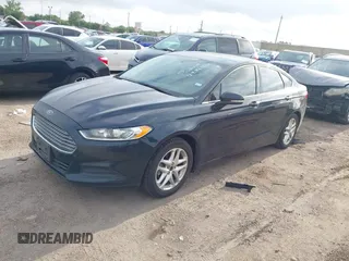 2014 Ford Fusion SE with VIN 3FA6P0HD3ER184294, listed as a IAAI auction lot 42141660 with 216,696 mi miles. Bid and sale history available at carsss.com. Image 2.