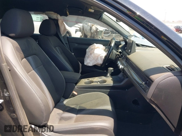 2023 Honda Civic Sport with VIN 19XFL2H86PE019273, listed as a IAAI auction lot 42066031 with 63,817 mi miles and . Bid and sale history available at DreamBid. Image 5.