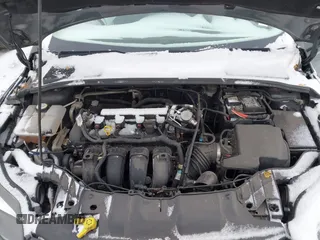 2013 Ford Focus SE z VIN 1FADP3F28DL337355, wystawiony jako IAAI lot #41000947 z przebiegiem 139 456 mil mil oraz . Historia ofert i sprzedaży dostępna na DreamBid. Obrazek 10.