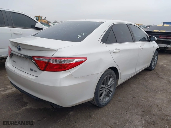 2015 Toyota Camry Hybrid LE with VIN 4T1BD1FK0FU175597, listed as a IAAI auction lot 41455315 with 116,380 mi miles. Bid and sale history available at carsss.com. Image 4.