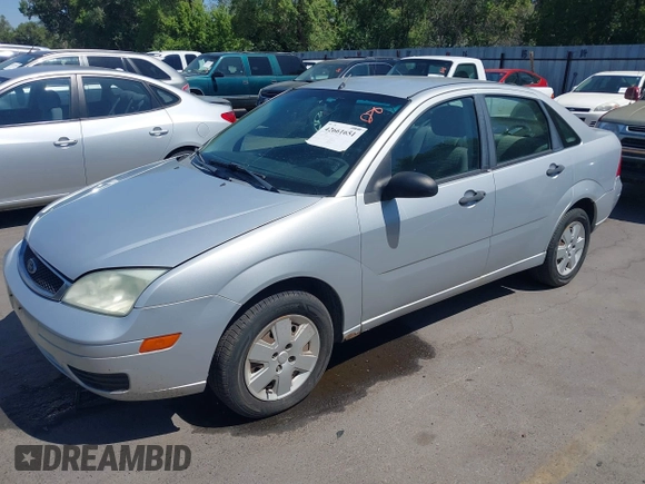 2007 Ford Focus S with VIN 1FAFP34N97W131230, listed as a IAAI auction lot 42661651 with 221,807 mi miles and . Bid and sale history available at DreamBid. Image 2.