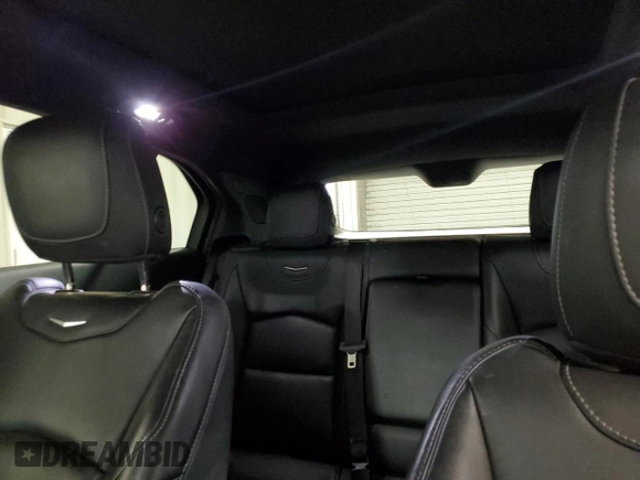 2021 Cadillac XT4 AWD Premium Luxury z VIN 1GYFZDR41MF001099, wystawiony jako Copart lot #48744655 z przebiegiem 57 633 mil mil oraz Czysty tytuł • Clean title. Historia ofert i sprzedaży dostępna na DreamBid. Obrazek 10.