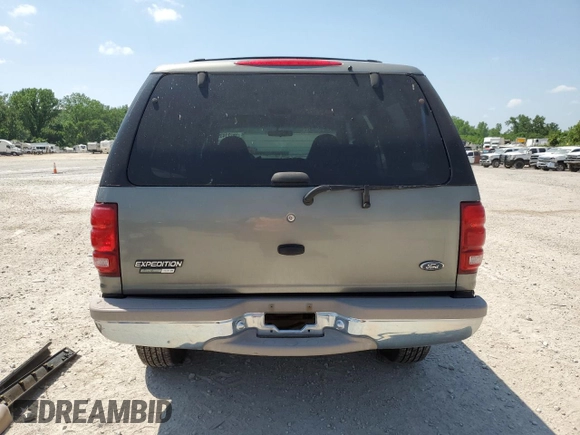 1999 Ford Expedition XLT z VIN 1FMPU18L0XLC03675, wystawiony jako Copart lot #56721435 z przebiegiem 111 652 mil mil oraz Szkoda całkowita • Salvage title. Historia ofert i sprzedaży dostępna na DreamBid. Obrazek 6.
