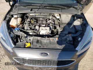 2018 Ford Focus SE z VIN 1FADP3FE4JL306237, wystawiony jako Copart lot #56482215 z przebiegiem 102 241 mil mil oraz Czysty tytuł • Clean title. Historia ofert i sprzedaży dostępna na DreamBid. Obrazek 11.