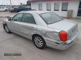 2005 Hyundai XG350 with VIN KMHFU45E65A414567, listed as a IAAI auction lot 41613364 with 264,839 mi miles. Bid and sale history available at carsss.com. Image 3.
