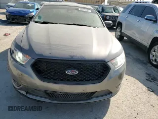 2014 Ford Taurus Limited z VIN 1FAHP2F88EG134315, wystawiony jako Copart lot #48550195 z przebiegiem 136 275 mil mil oraz Szkoda całkowita • Salvage title. Historia ofert i sprzedaży dostępna na DreamBid. Obrazek 10.