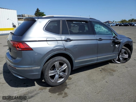 2021 Volkswagen Tiguan SE with VIN 3VV2B7AX2MM075326, listed as a Copart auction lot 52449985 with 8,034 mi miles and Salvage Title. Bid and sale history available at carsss.com. Image 3.
