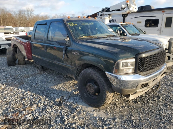 2003 Ford F-350 XL with VIN 1FTWW33F63EA29777, listed as a Copart auction lot 81047684 with 214,722 mi miles and Salvage Title. Bid and sale history available at DreamBid. Image 4.