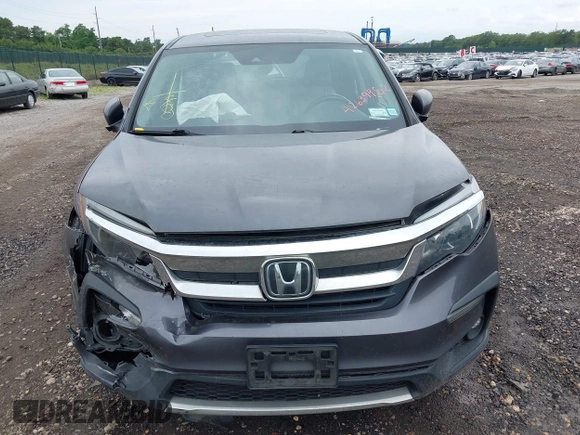 2019 Honda Pilot EX-L with VIN 5FNYF6H5XKB096065, listed as a IAAI auction lot 42631239 with 171,768 mi miles and . Bid and sale history available at DreamBid. Image 12.