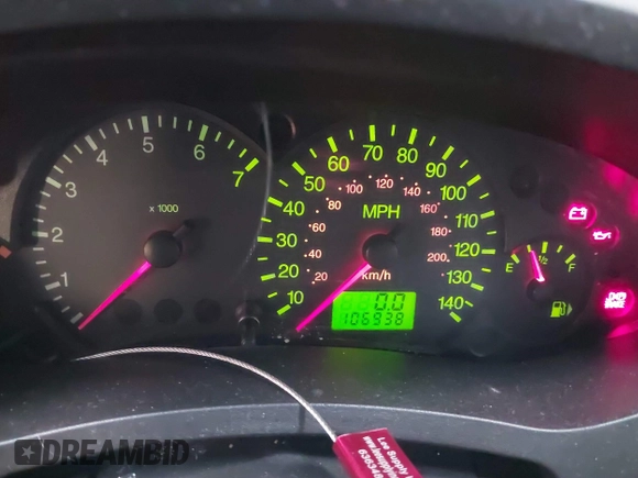 2007 Ford Focus S z VIN 1FAHP34N17W104080, wystawiony jako IAAI lot #41541274 z przebiegiem 106 938 mil mil oraz . Historia ofert i sprzedaży dostępna na DreamBid. Obrazek 7.