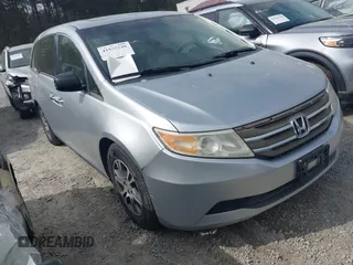 2012 Honda Odyssey EX-L with VIN 5FNRL5H66CB069916, listed as a IAAI auction lot 41935248 with 230,204 mi miles and . Bid and sale history available at carsss.com. Image 1.
