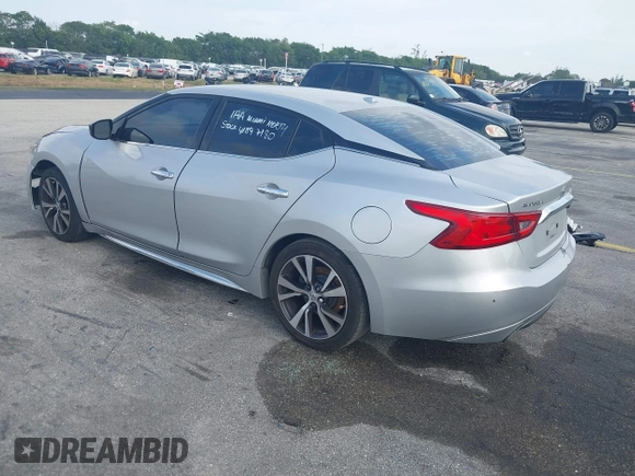 2016 Nissan Maxima SL with VIN 1N4AA6AP0GC433932, listed as a IAAI auction lot 41897180 with 91,871 mi miles and . Bid and sale history available at DreamBid. Image 3.
